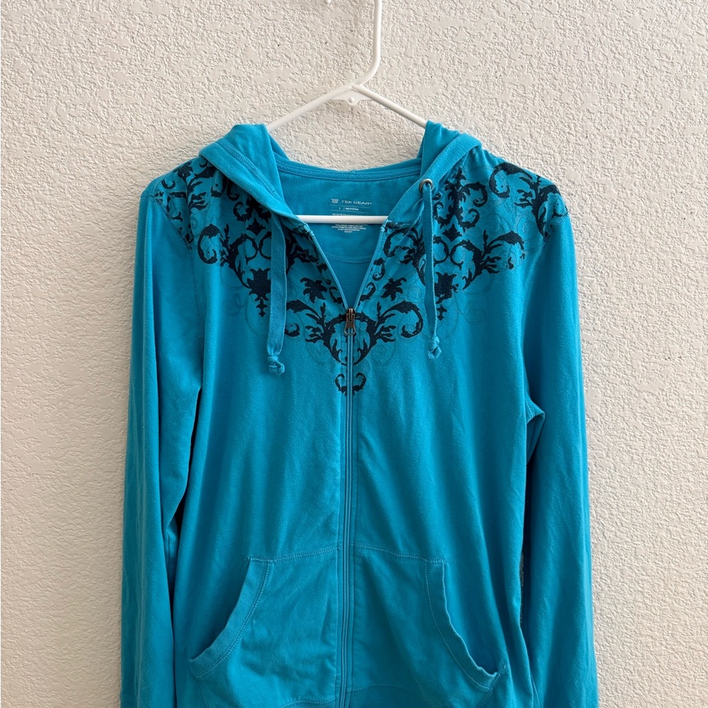 Tek Gear Turquoise Jacket with Black Floral Accents